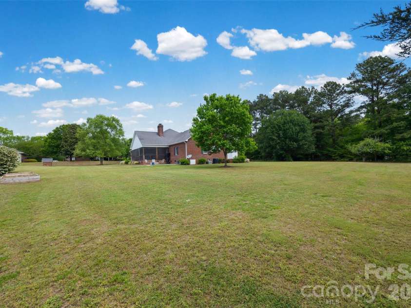 738 Costner School Road, Bessemer City, NC 28016.  MLS# CAR4373154, YatesRealty ID 18704. Level Yard