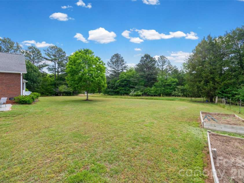 738 Costner School Road, Bessemer City, NC 28016.  MLS# CAR4373154, YatesRealty ID 18704. Level Yard