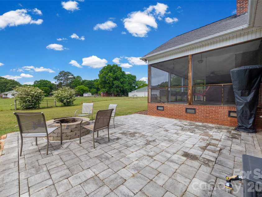 738 Costner School Road, Bessemer City, NC 28016.  MLS# CAR4373154, YatesRealty ID 18704. Paver Patio w/firepit