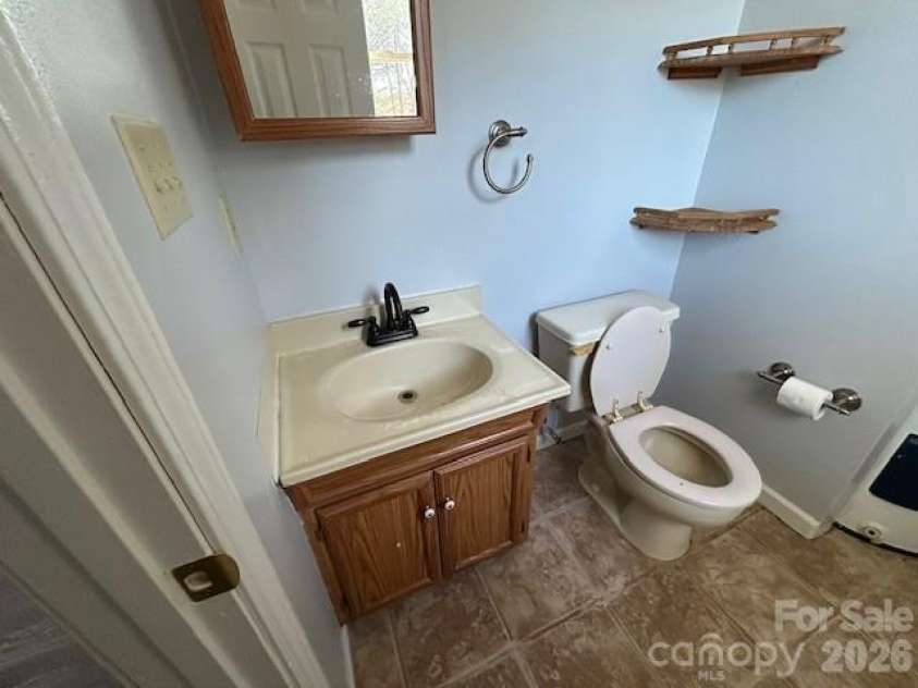 1616 Lazenby Street, Newton, NC 28658.  MLS# CAR4266358, YatesRealty ID 18709. Half bath