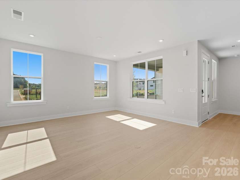 323 Ardmore Drive, Belmont, NC 28012.  MLS# CAR4378227, YatesRealty ID 18709. Light filled living room