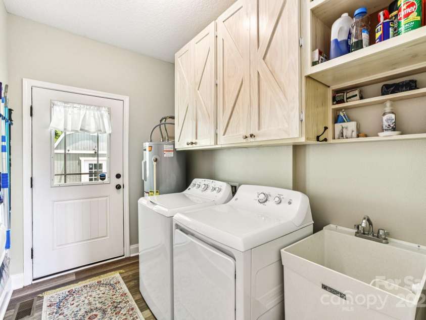 410 Moonlight Trail, Bryson City, NC 28713.  MLS# CAR4267033, YatesRealty ID 18712. Laundry area with utility sink