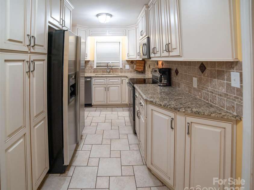 2411 Allendale Circle, Lenoir, NC 28645.  MLS# CAR4265888, YatesRealty ID 18717. Updated cabinets and granite countertops