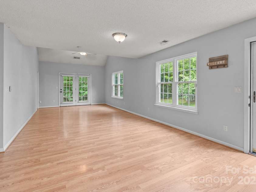 4557 Panther Place, Charlotte, NC 28269.  MLS# CAR4264508, YatesRealty ID 18722. Great Room/Dining Area