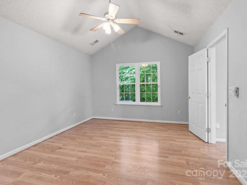 4557 Panther Place, Charlotte, NC 28269.  MLS# CAR4264508, YatesRealty ID 18722. Primary Bedroom on Main