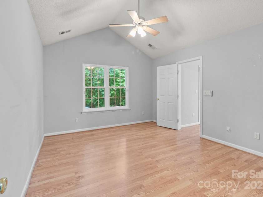4557 Panther Place, Charlotte, NC 28269.  MLS# CAR4264508, YatesRealty ID 18722. Primary Bedroom on Main