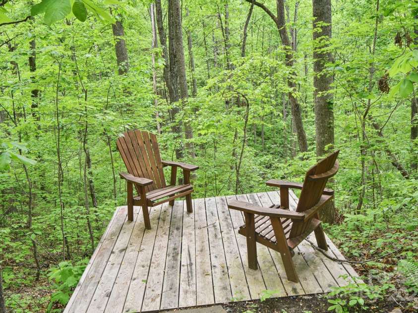 675 Terrys Gap Road, Hendersonville, NC 28792.  MLS# CAR4253126, YatesRealty ID 18724. Ultimate privacy with scenic, protected views