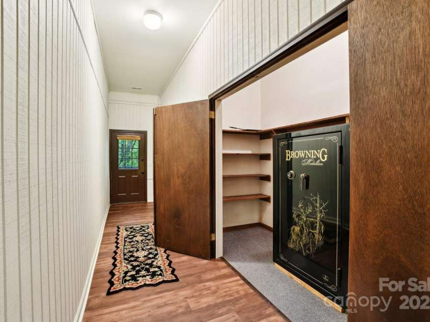 675 Terrys Gap Road, Hendersonville, NC 28792.  MLS# CAR4253126, YatesRealty ID 18724. What a great storage space with convenient access and plenty of shelving