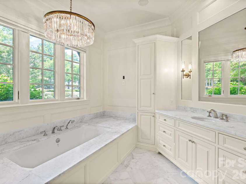 4536 Parview Drive, Charlotte, NC 28226.  MLS# CAR4376989, YatesRealty ID 18729. His and her primary bathrooms & closets