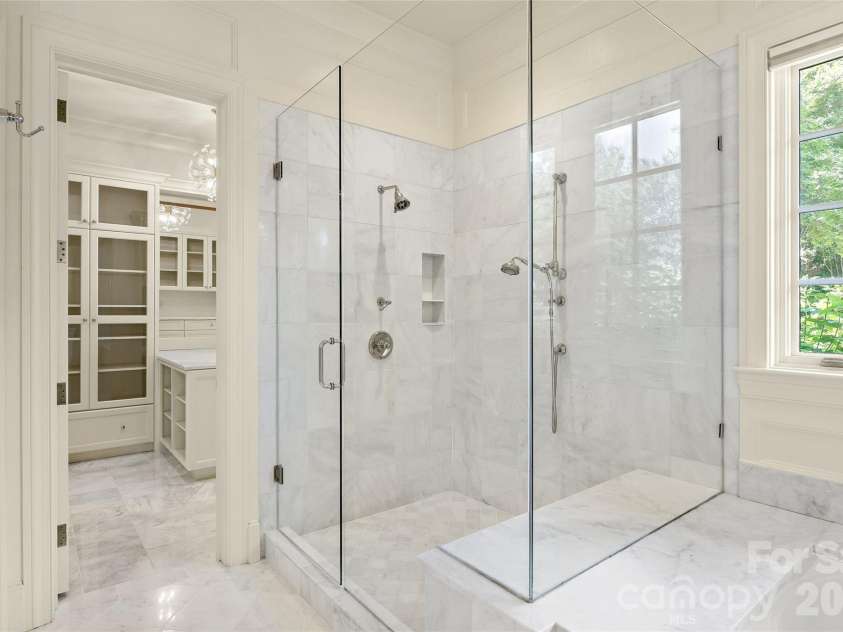 4536 Parview Drive, Charlotte, NC 28226.  MLS# CAR4376989, YatesRealty ID 18729. His and her primary bathrooms & closets