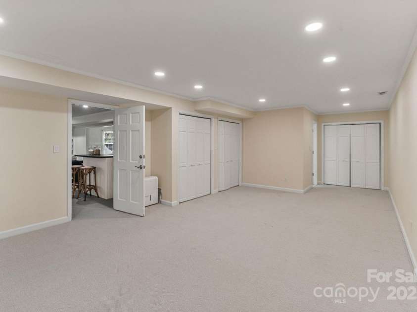 5125 Winding Brook Road, Charlotte, NC 28226.  MLS# CAR4241035, YatesRealty ID 18729. Basement Bedroom