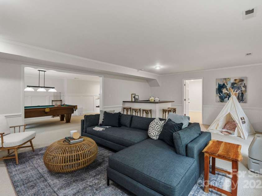 5125 Winding Brook Road, Charlotte, NC 28226.  MLS# CAR4241035, YatesRealty ID 18729. Basement Rec Room features Wet Bar & Dining Space