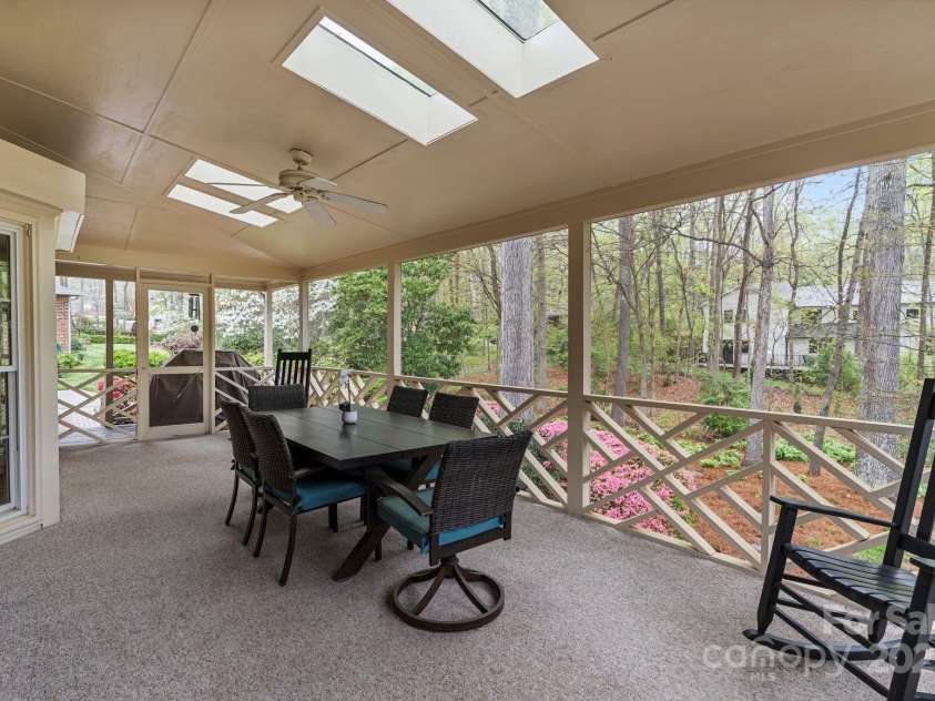 5125 Winding Brook Road, Charlotte, NC 28226.  MLS# CAR4241035, YatesRealty ID 18729. Screened Porch looks out to peaceful backyard