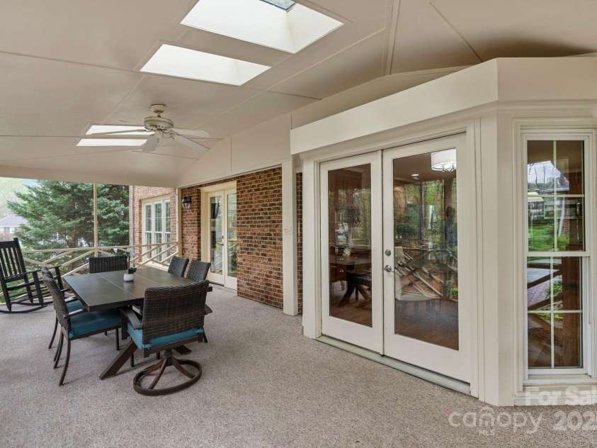 5125 Winding Brook Road, Charlotte, NC 28226.  MLS# CAR4241035, YatesRealty ID 18729. Screened Porch with entrances to Kitchen & Family Room