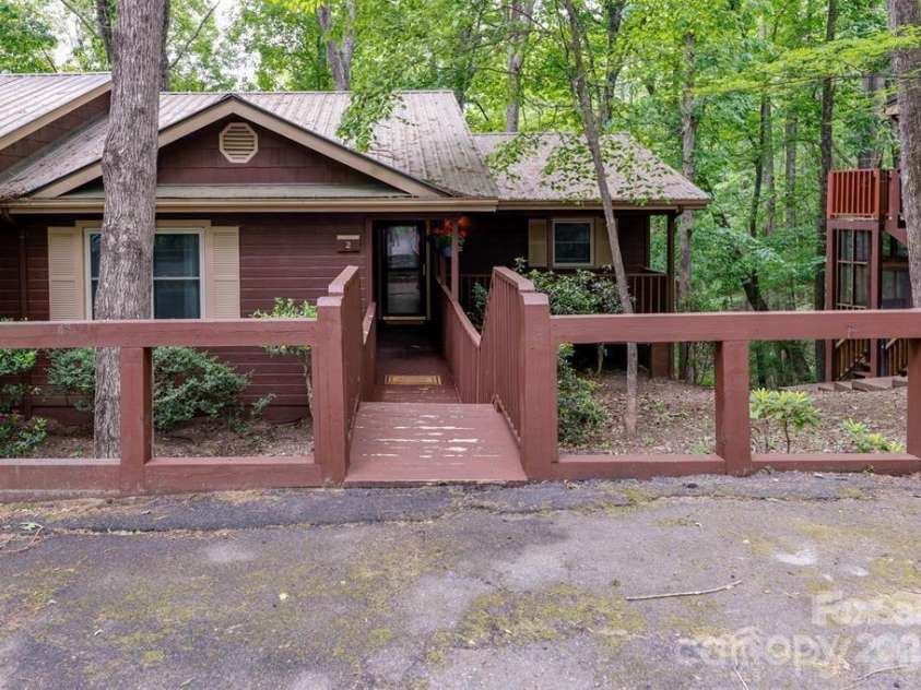 385 Whitney Boulevard, Lake Lure, NC 28746.  MLS# CAR4351319, YatesRealty ID 18735. 
