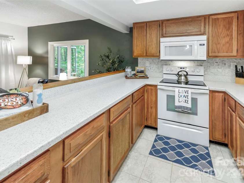 385 Whitney Boulevard, Lake Lure, NC 28746.  MLS# CAR4351319, YatesRealty ID 18735. 