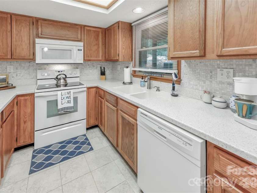 385 Whitney Boulevard, Lake Lure, NC 28746.  MLS# CAR4351319, YatesRealty ID 18735. 