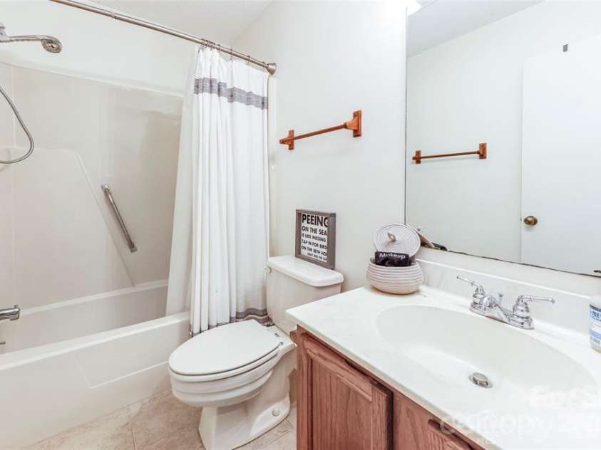385 Whitney Boulevard, Lake Lure, NC 28746.  MLS# CAR4351319, YatesRealty ID 18735. 