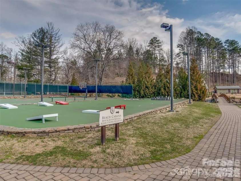 385 Whitney Boulevard, Lake Lure, NC 28746.  MLS# CAR4351319, YatesRealty ID 18735. 