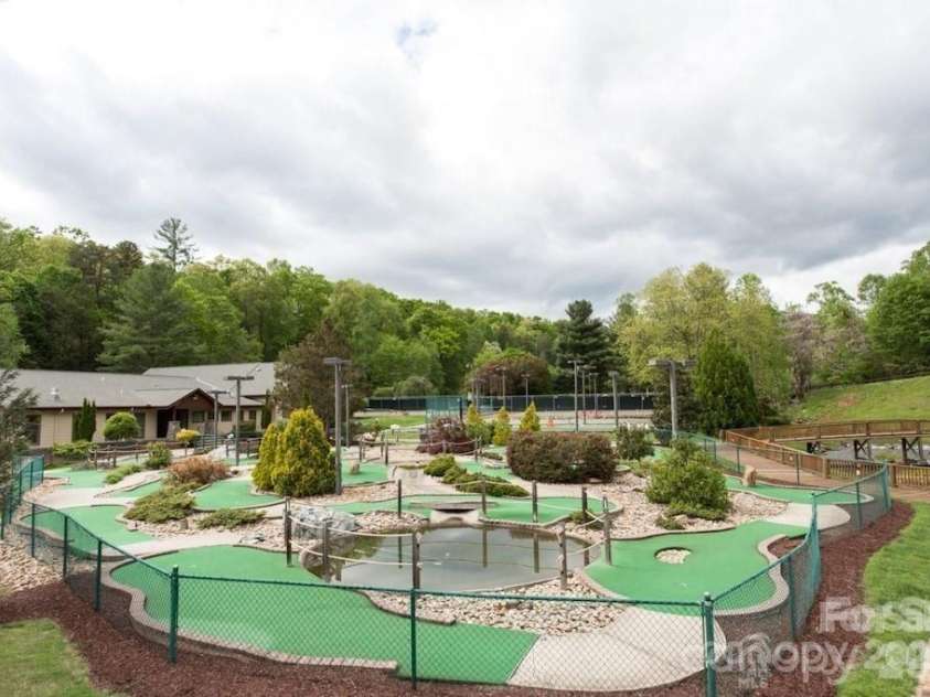 385 Whitney Boulevard, Lake Lure, NC 28746.  MLS# CAR4351319, YatesRealty ID 18735. 