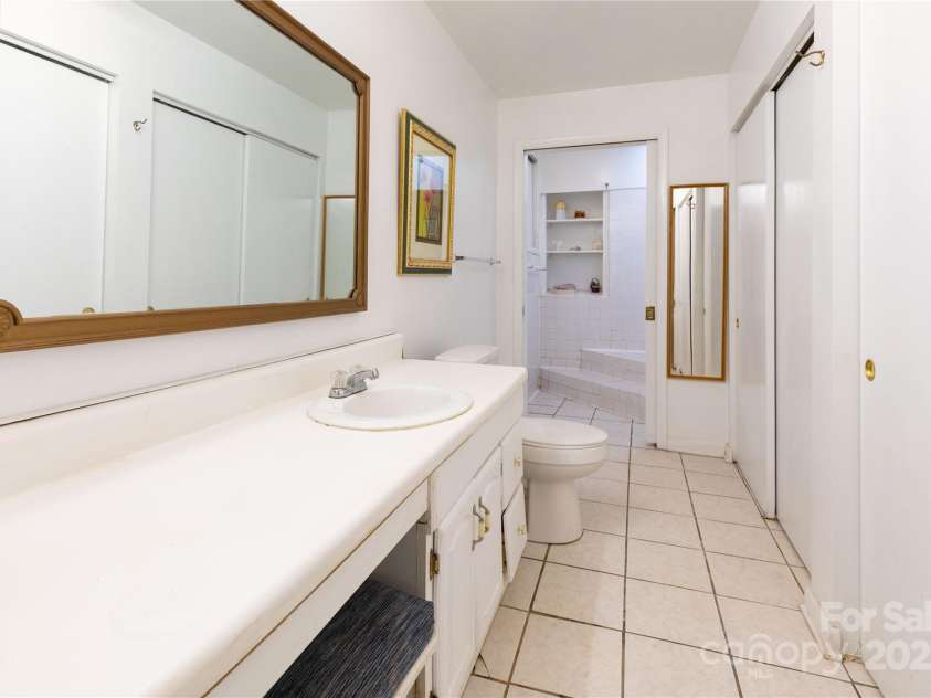 28 & 29 Spruce Chase Lane, Swannanoa, NC 28778.  MLS# CAR4251000, YatesRealty ID 18737. Apartment Bathroom