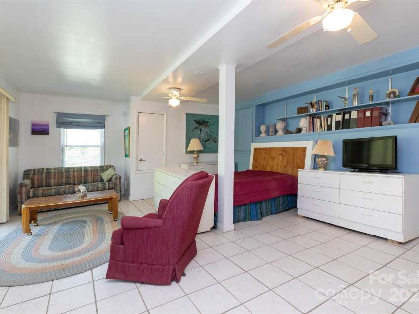 28 & 29 Spruce Chase Lane, Swannanoa, NC 28778.  MLS# CAR4251000, YatesRealty ID 18737. Apartment Living/Sleeping Area