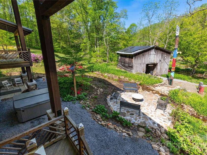 28 & 29 Spruce Chase Lane, Swannanoa, NC 28778.  MLS# CAR4251000, YatesRealty ID 18737. Main Level Deck overlooking Gardens