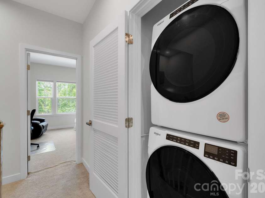 336 Twinflower Lane, Charlotte, NC 28205.  MLS# CAR4367102, YatesRealty ID 18739. Conveniently placed laundry on the same level as the primary suite and secondary bedroom.