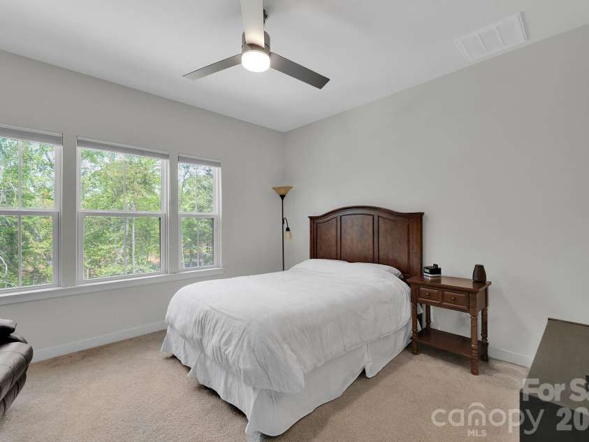336 Twinflower Lane, Charlotte, NC 28205.  MLS# CAR4367102, YatesRealty ID 18739. Relaxing primary retreat complete with an ensuite bath and a spacious walk in closet.