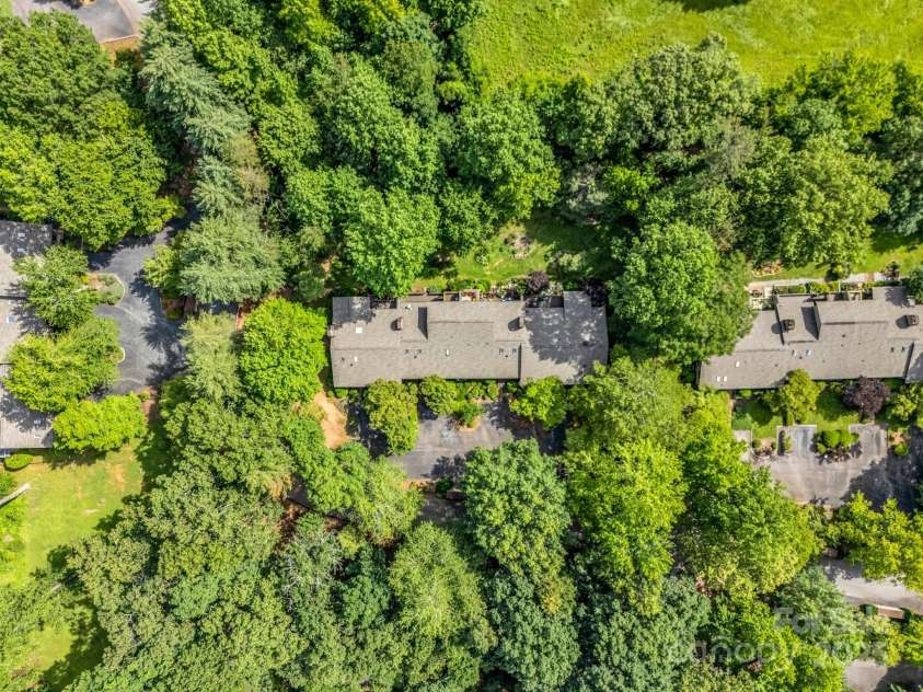 8 Hunting Country Trail, Tryon, NC 28782.  MLS# CAR4244551, YatesRealty ID 18739. Aerial view of the community