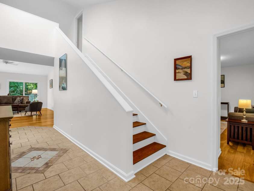 8 Hunting Country Trail, Tryon, NC 28782.  MLS# CAR4244551, YatesRealty ID 18739. One of the few two story units with a bedroom suite on each level