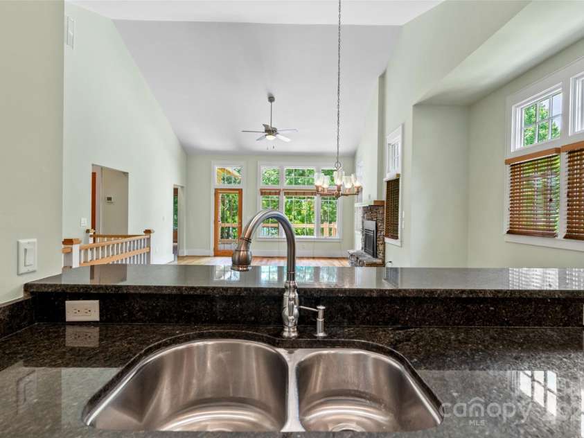 50 Mandolin Drive, Black Mountain, NC 28711.  MLS# CAR4264408, YatesRealty ID 18743. I really appreciate the vaulted ceilings, the openness of the space, and the large windows that give me a view of the outdoors. I feel closer to nature, friends and family when I am in the kitchen.