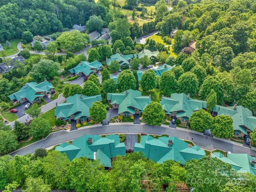 50 Mandolin Drive, Black Mountain, NC 28711.  MLS# CAR4264408, YatesRealty ID 18743. Live in a Luxury Arts and Crafts Style Community and be one of 32 Townhomes on 6 Beautifully Landscaped acres!