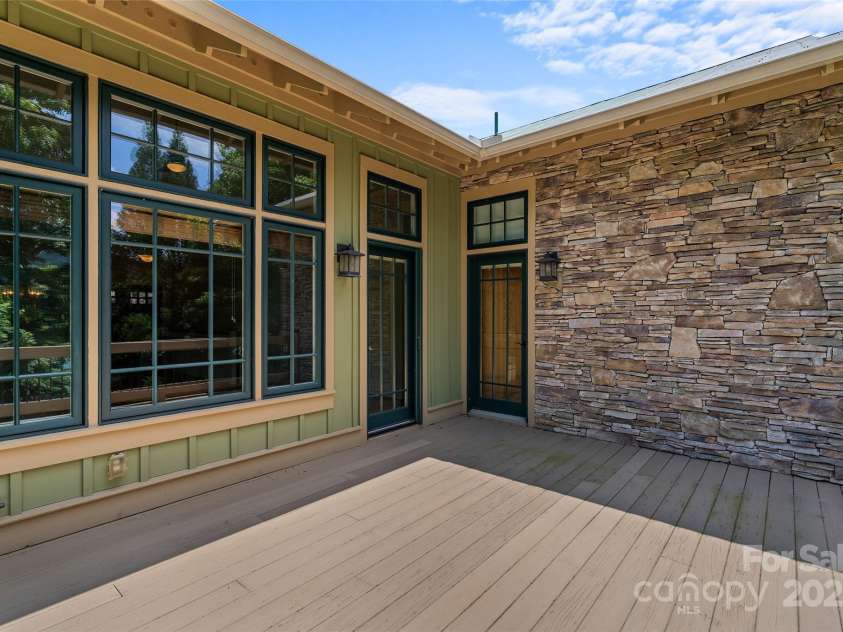 50 Mandolin Drive, Black Mountain, NC 28711.  MLS# CAR4264408, YatesRealty ID 18743. Step onto the spacious balcony just off the master suite and living room.  It's your place to enjoy your morning coffee, to settle in and unwind after a long day.  Here is where you can savor the fresh mountain air 