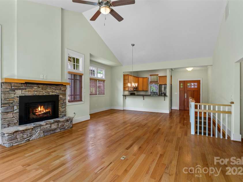50 Mandolin Drive, Black Mountain, NC 28711.  MLS# CAR4264408, YatesRealty ID 18743. This fall and winter you can relax and enjoy the fireplace’s warmth with a hot cider and a good book, favorite movie or friends and family. It’s what no mountain home is complete without!