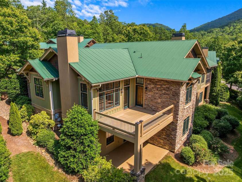 50 Mandolin Drive, Black Mountain, NC 28711.  MLS# CAR4264408, YatesRealty ID 18743. This home has it all: natural materials, a serene setting, and breathtaking scenery.