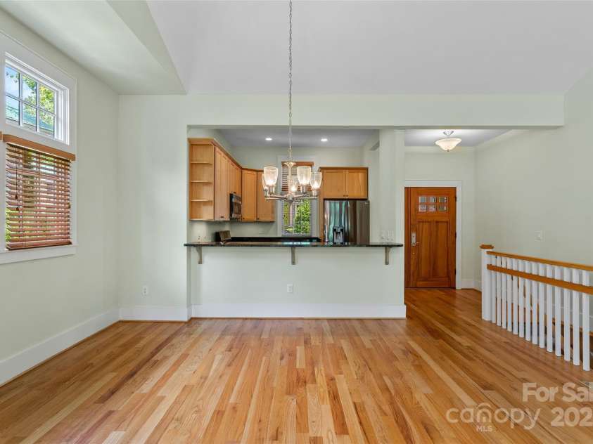 50 Mandolin Drive, Black Mountain, NC 28711.  MLS# CAR4264408, YatesRealty ID 18743. This house is hard to leave, for good reason, as it's easy to love. Features like a roomy dining room and a breakfast bar make it a perfect spot for everything from entertainment to crafts.