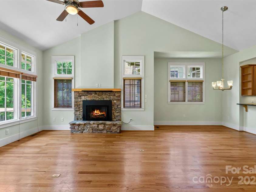 50 Mandolin Drive, Black Mountain, NC 28711.  MLS# CAR4264408, YatesRealty ID 18743. This stunning home features an open floor plan that rivals most townhomes. What really sets it apart are the beautiful tall windows that allow for an abundance of natural light, the cathedral vaulted ceilings, and t