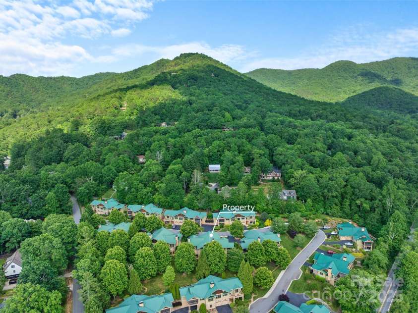 50 Mandolin Drive, Black Mountain, NC 28711.  MLS# CAR4264408, YatesRealty ID 18743. Well within the Nine South Community of townhomes, and far from the main road, this property is a sweet, quiet retreat to call home.