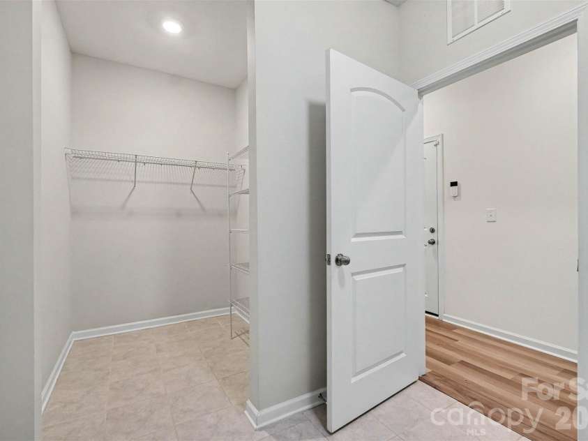 10883 Sparkle Creek Drive, Midland, NC 28107.  MLS# CAR4376568, YatesRealty ID 18746. Laundry room