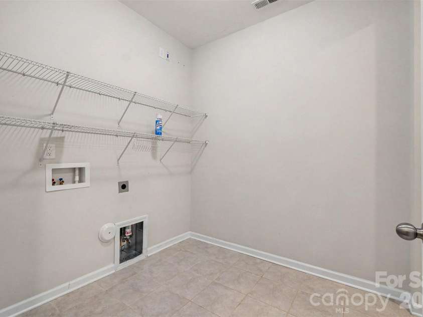 10883 Sparkle Creek Drive, Midland, NC 28107.  MLS# CAR4376568, YatesRealty ID 18746. Laundry room