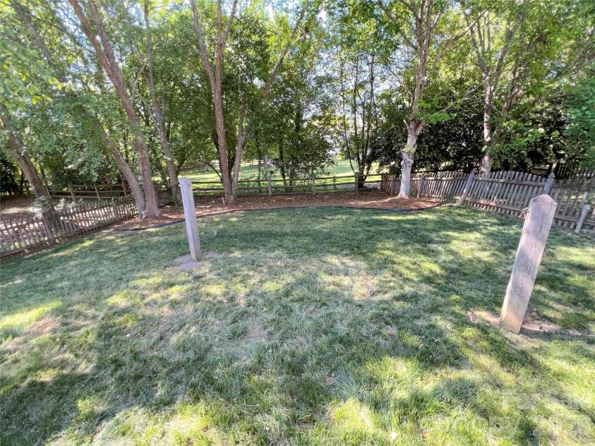 6501 Outer Bridge Lane, Charlotte, NC 28270.  MLS# CAR4377519, YatesRealty ID 18747. Another backyard view.