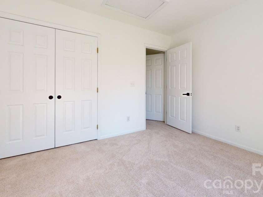 6501 Outer Bridge Lane, Charlotte, NC 28270.  MLS# CAR4377519, YatesRealty ID 18747. Another spacious upstairs bedroom.