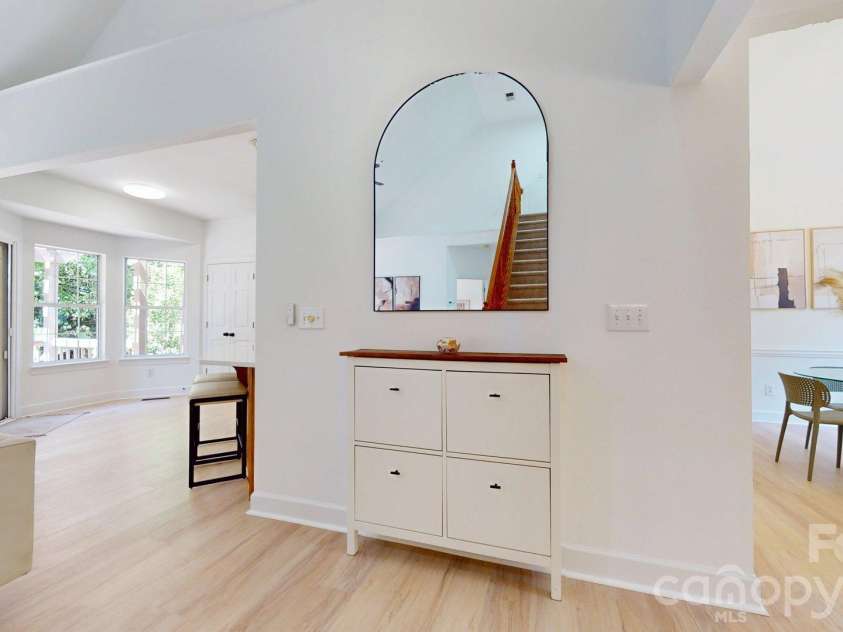 6501 Outer Bridge Lane, Charlotte, NC 28270.  MLS# CAR4377519, YatesRealty ID 18747. Foyer wall.