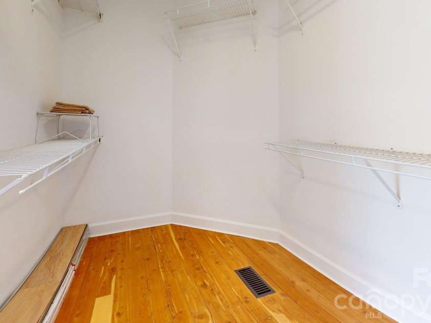 6501 Outer Bridge Lane, Charlotte, NC 28270.  MLS# CAR4377519, YatesRealty ID 18747. Large primary bedroom walk-in closet