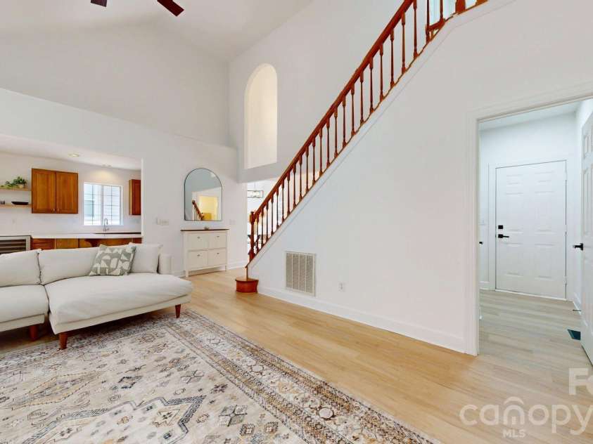 6501 Outer Bridge Lane, Charlotte, NC 28270.  MLS# CAR4377519, YatesRealty ID 18747. View from living room toward foyer.