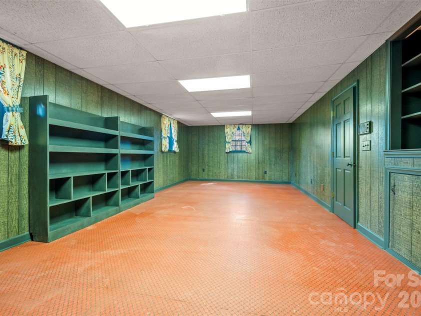 149 Woodbriar Drive, Forest City, NC 28043.  MLS# CAR4342041, YatesRealty ID 18748. Lower-Level Den