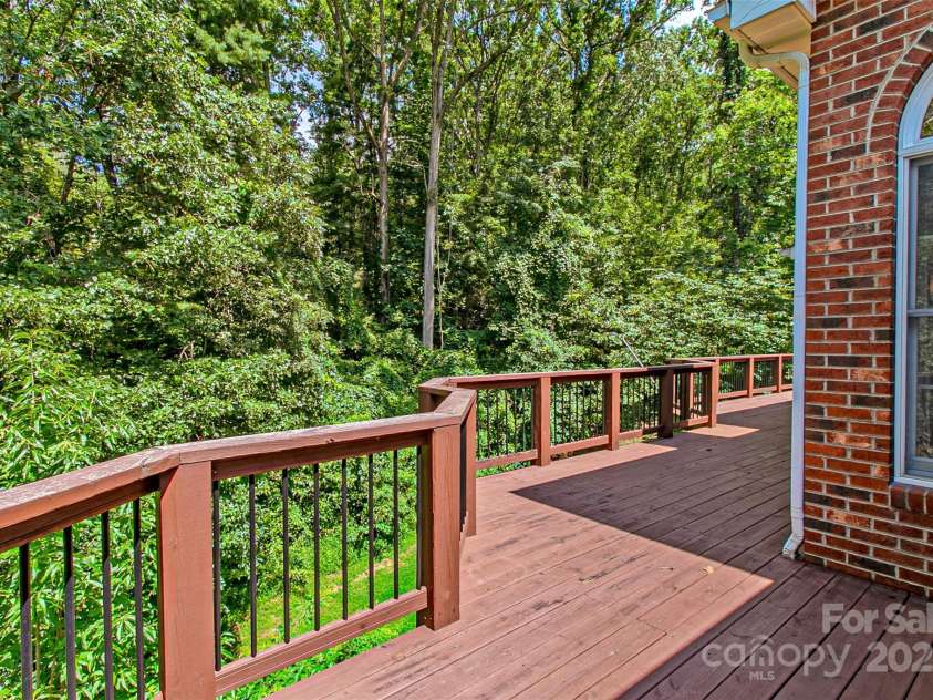 185 Oak Ridge Drive, Clyde, NC 28721.  MLS# CAR4289046, YatesRealty ID 18749. Expansive Deck for Outside Living!!