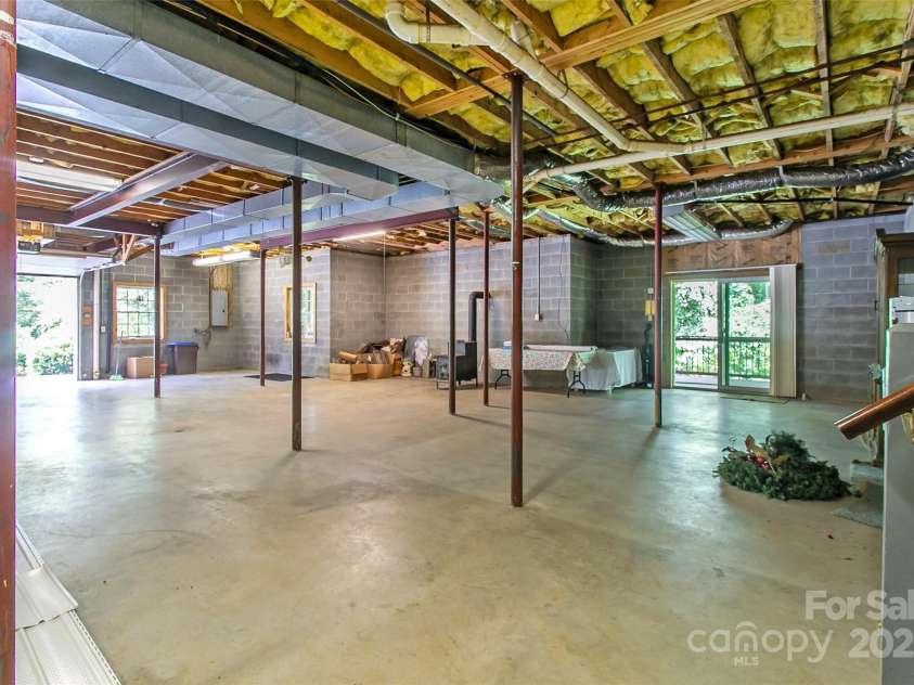 185 Oak Ridge Drive, Clyde, NC 28721.  MLS# CAR4289046, YatesRealty ID 18749. Huge Basement for Expansion / Storage