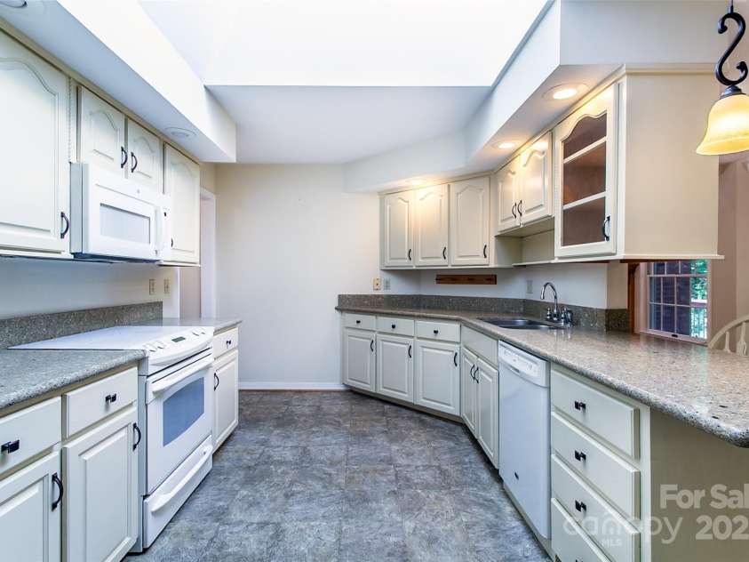 185 Oak Ridge Drive, Clyde, NC 28721.  MLS# CAR4289046, YatesRealty ID 18749. Kitchen - Natural Skylight